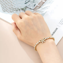Load image into Gallery viewer, Exquisite 14 K Gold Plated bow bracelet with white zirconia
