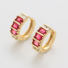Load image into Gallery viewer, 14 K Gold Plated huggy earrings with pink zirconia