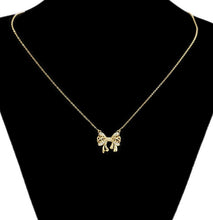Load image into Gallery viewer, 14 K Gold Plated bow necklace, bracelet and earrings set with white zirconium