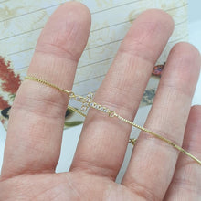 Load image into Gallery viewer, 14 K Gold Plated cross bracelet with white zirconium - BIJUNET