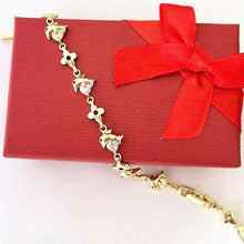 Load image into Gallery viewer, 14 K Gold Plated dolphin bracelet with multicoloured zirconium - BIJUNET