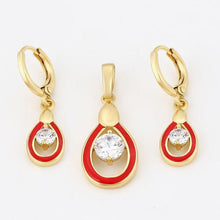 Load image into Gallery viewer, 14 K Gold Plated pendant and earrings set with white zirconium - BIJUNET