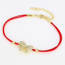 Charger l'image dans la galerie, 14 K Gold Plated red string bow bracelet with white zirconium - BIJUNET