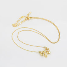 Load image into Gallery viewer, 14 K Gold Plated bow necklace, bracelet and earrings set with white zirconium