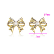 Load image into Gallery viewer, 14 K Gold Plated bow earrings with white zirconia