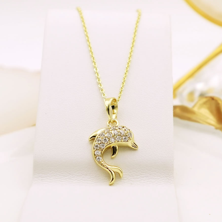 14 K Gold Plated dolphin pendant with white zirconia