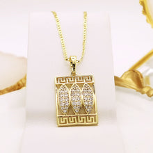 Cargar imagen en el visor de la galería, 14 K Gold Plated key pendant with white zirconia