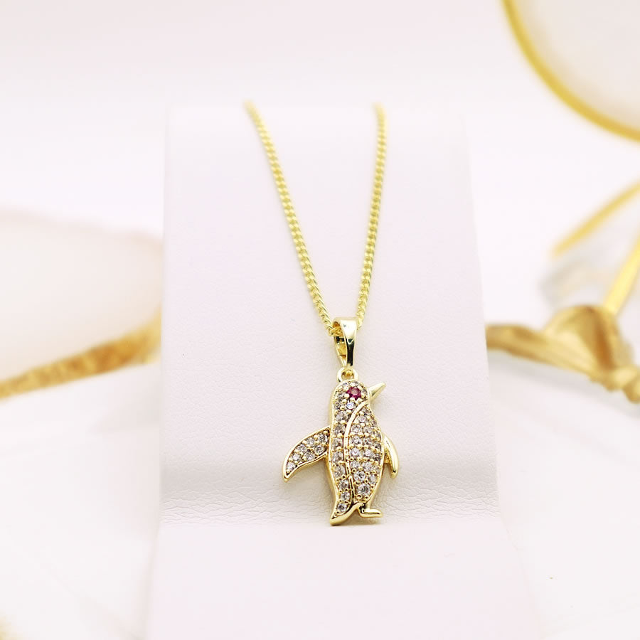 14 K Gold Plated penguin pendant with white zirconia