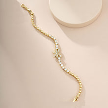 Load image into Gallery viewer, Exquisite 14 K Gold Plated bow bracelet with white zirconia
