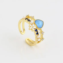 Load image into Gallery viewer, 14 K Gold Plated ring with blue zirconium
