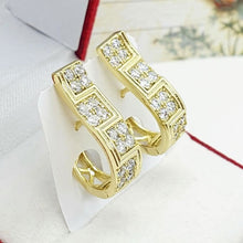 Load image into Gallery viewer, 14 K Gold and Rhodium Plated earrings with white zirconium - BIJUNET
