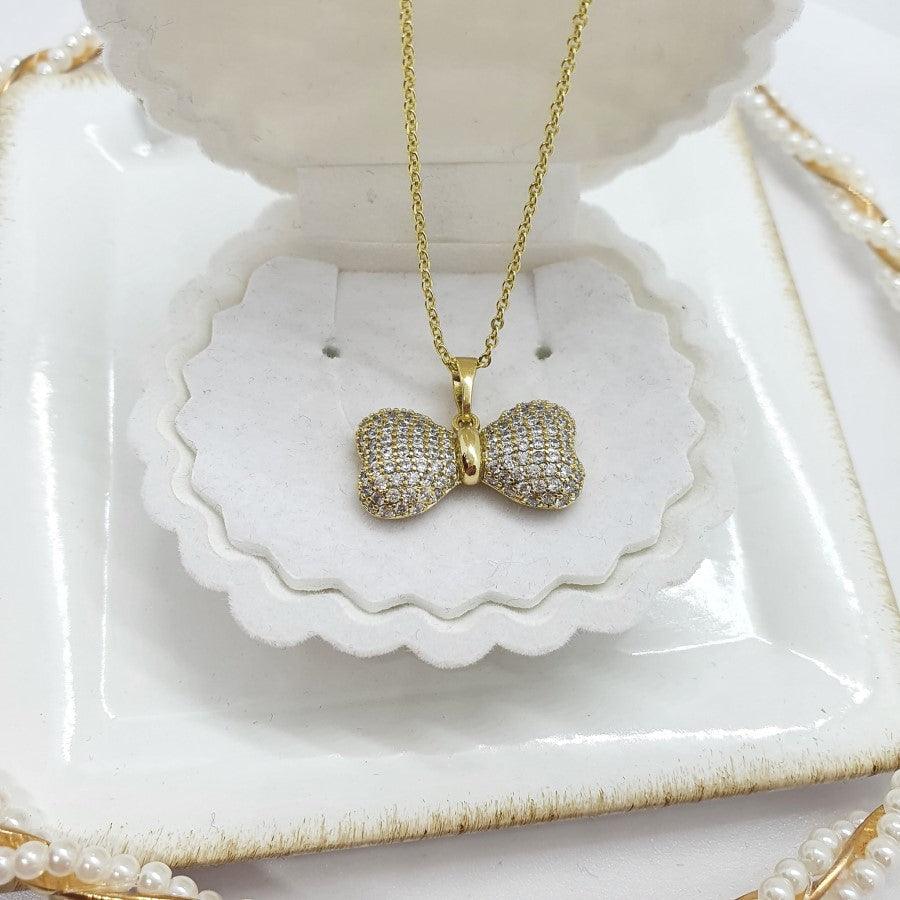 14 K Gold Plated bow pendant with white zirconium - BIJUNET