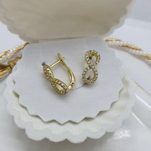 Load image into Gallery viewer, 14 K Gold Plated infinity earrings with white zirconium - BIJUNET
