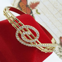 Load image into Gallery viewer, 14 K Gold Plated music key sol bangle with white zirconium - BIJUNET
