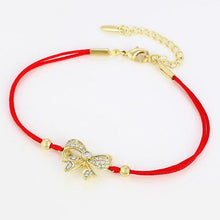 Load image into Gallery viewer, 14 K Gold Plated red string bow bracelet with white zirconium - BIJUNET
