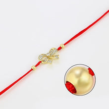 Load image into Gallery viewer, 14 K Gold Plated red string bow bracelet with white zirconium - BIJUNET
