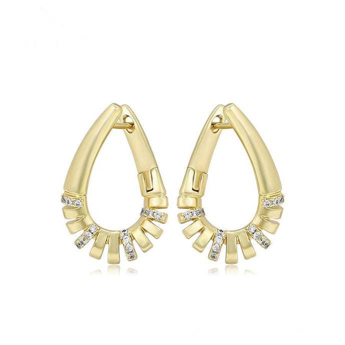14 K Gold Plated twisted earrings with white zirconium - BIJUNET