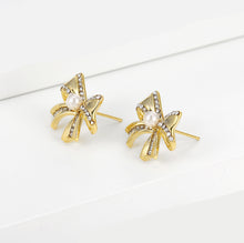 Load image into Gallery viewer, 14 K Gold Plated bow earrings with white zirconia
