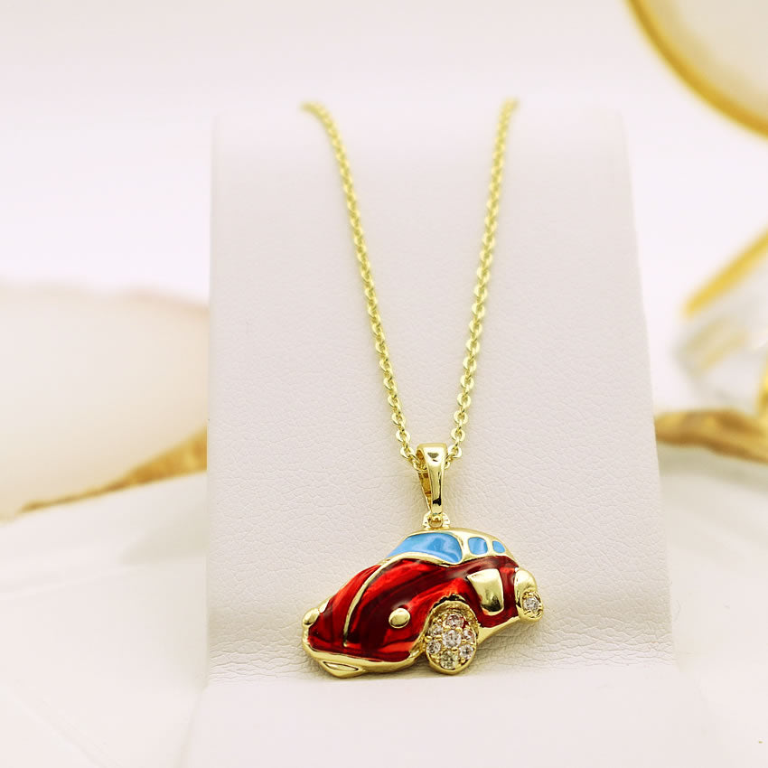14 K Gold Plated car pendant with white zirconia