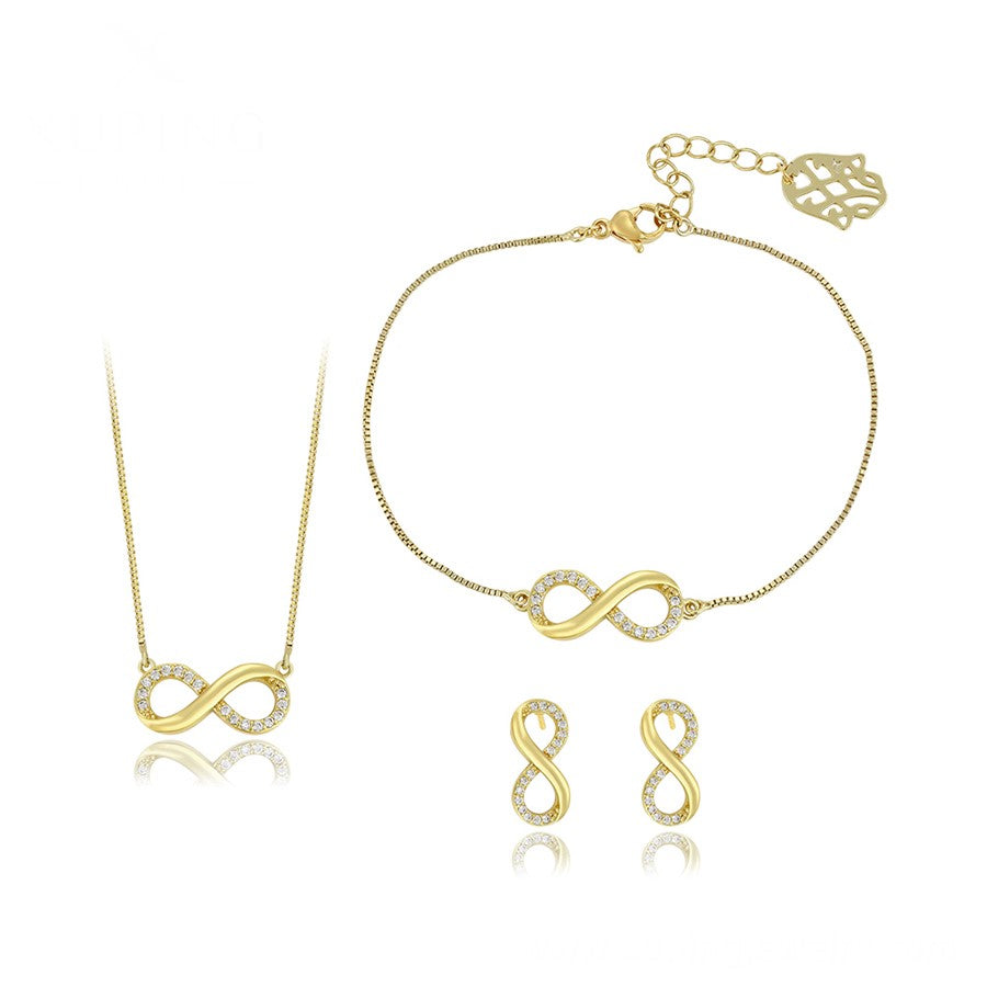 14 K Gold Plated infinity necklace, bracelet and earrings set with white zirconium