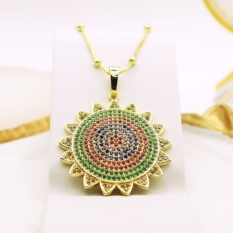 14 K Gold Plated sun pendant with coloured zirconia