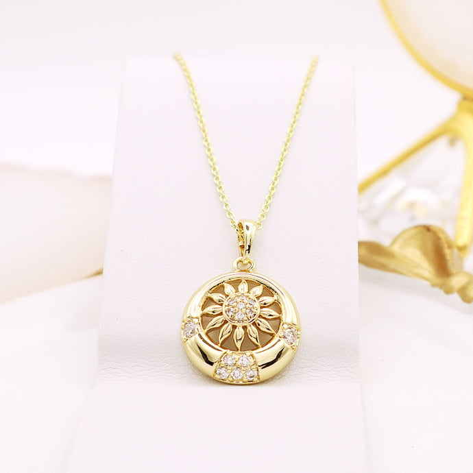 14 K Gold Plated sun pendant with white zirconia